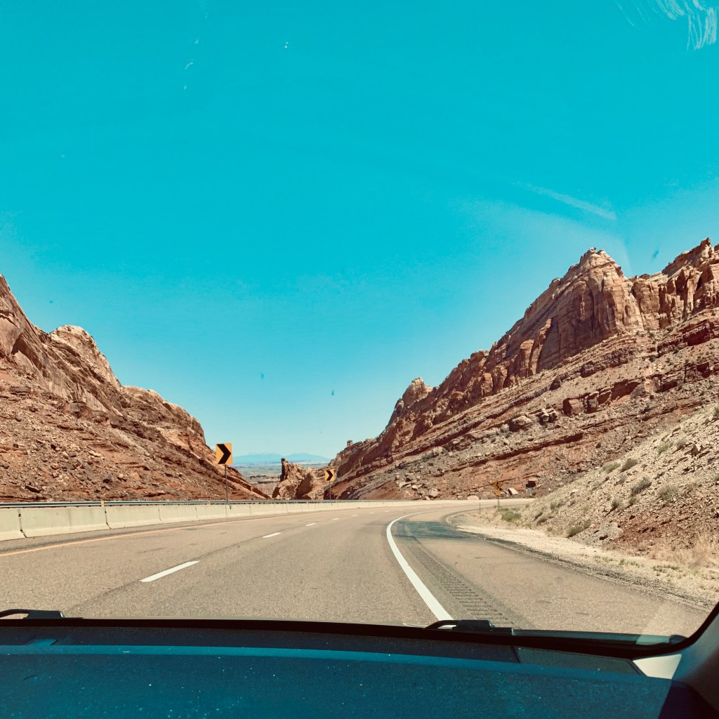 Driving on Interstate 70 passing Black Dragon Canyon Viewpoint
